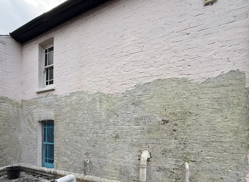 cementitious_coating_under_modern_paint_brick_example.webp